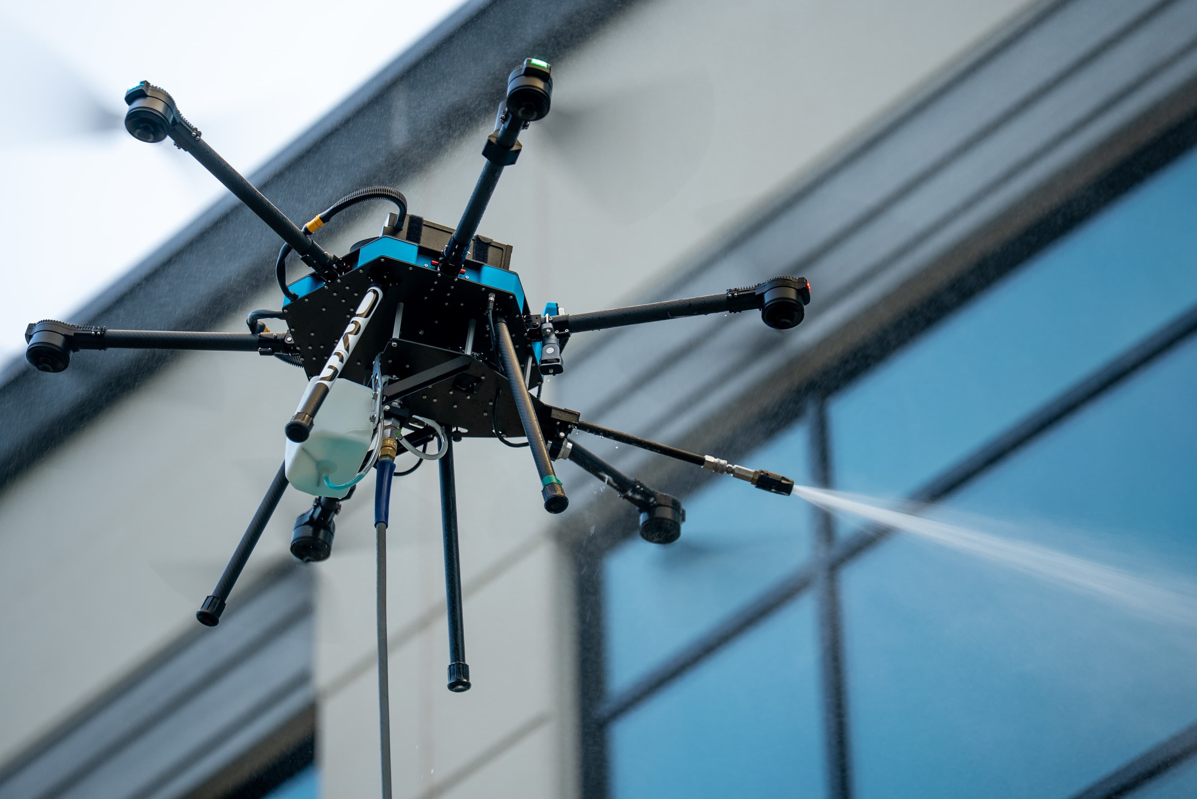 SkyCare drone cleaning commercial building